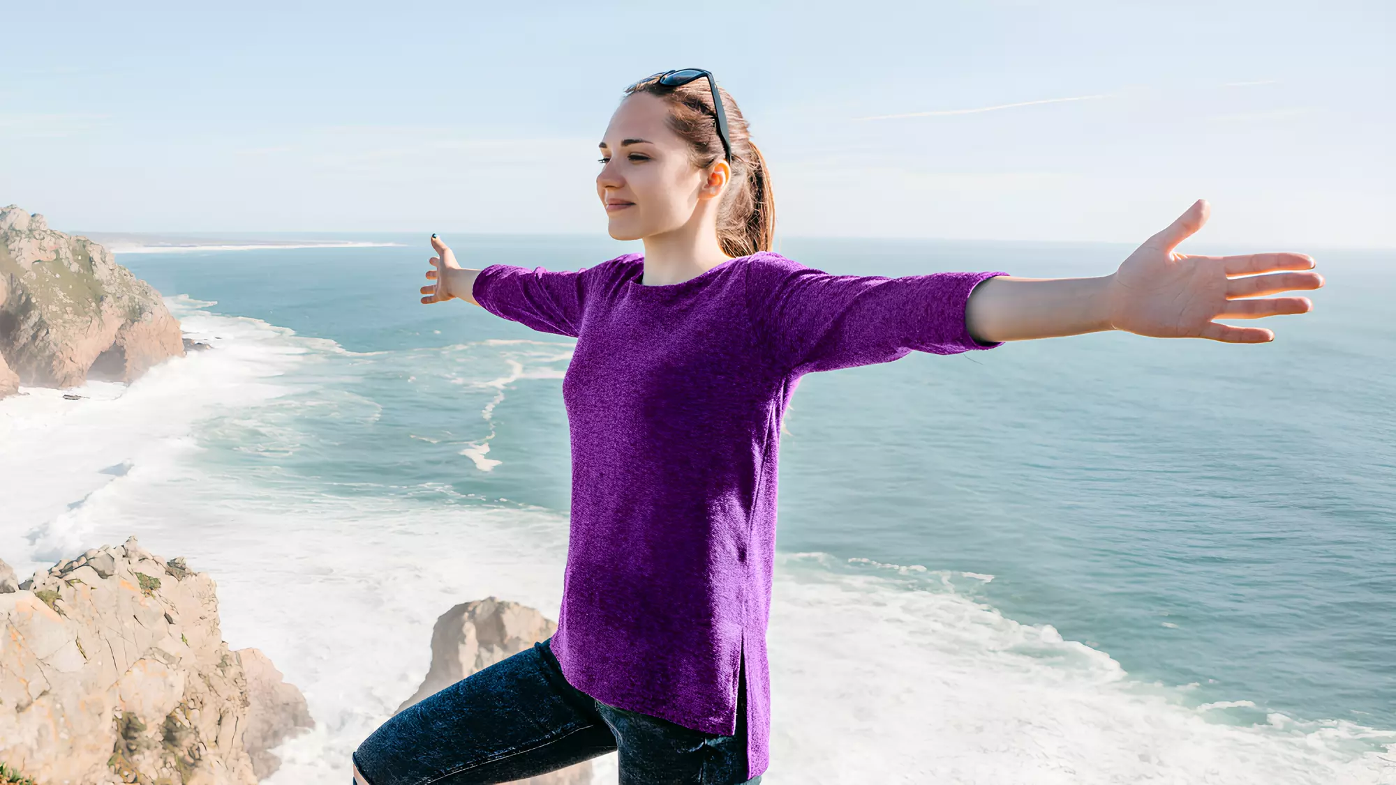 Women confidently balancing on the beach